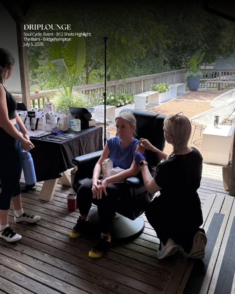 Guest receiving a B12 shot on the deck at SoulCycle The Barn Bridgehampton